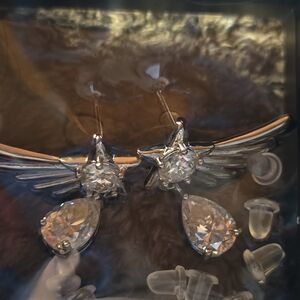 Elegant Silver Winged Earrings With Moissanite